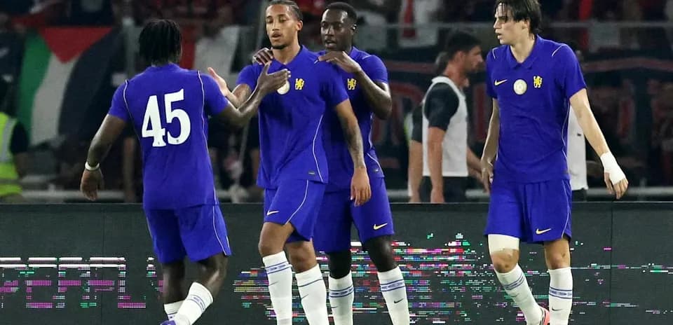 Players celebrating a goal during football match