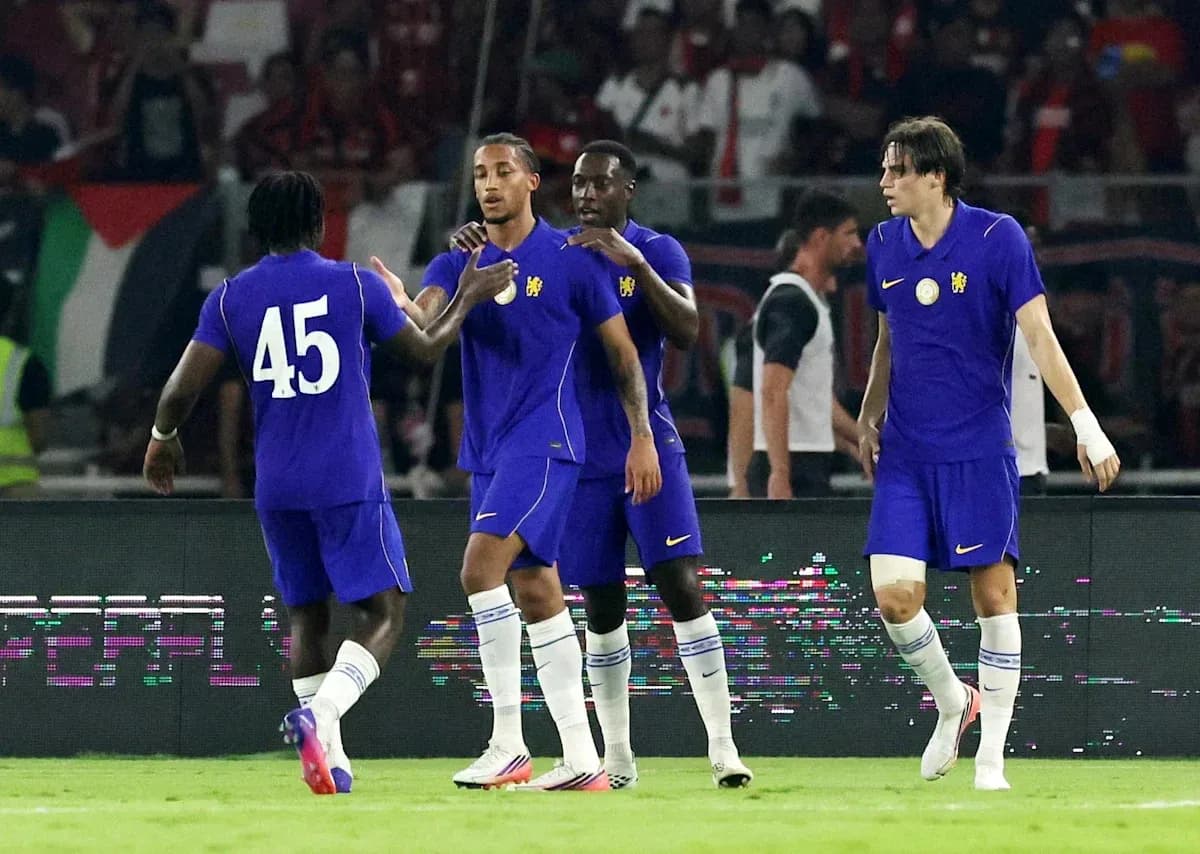 Players celebrating a goal during football match