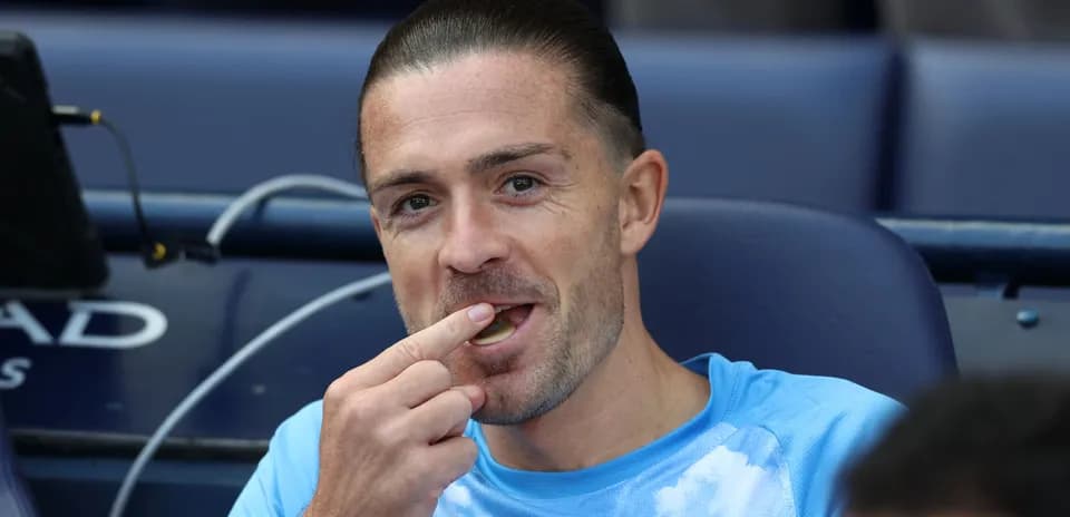 Player sitting on bench eating during match