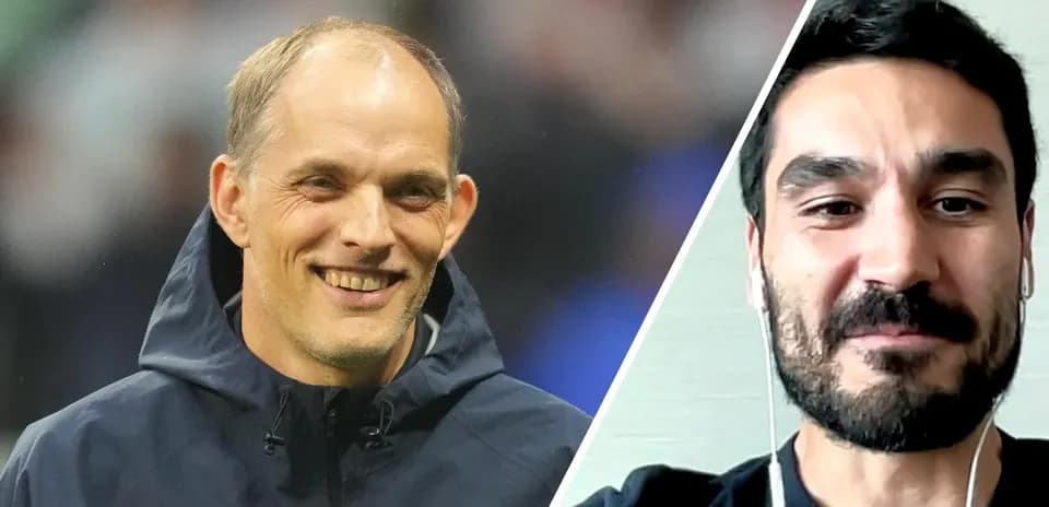 Thomas Tuchel and Ilkay Gundogan smiling during discussion