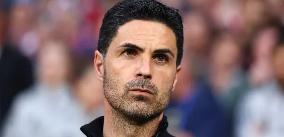 Coach observing match from the sidelines