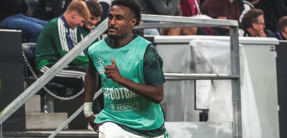Player warming up on the sidelines during match