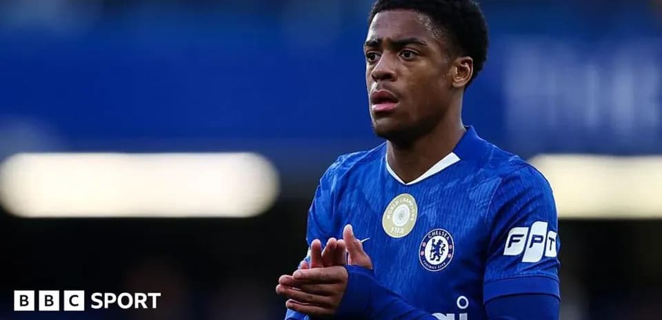 Player in blue Chelsea kit during match action