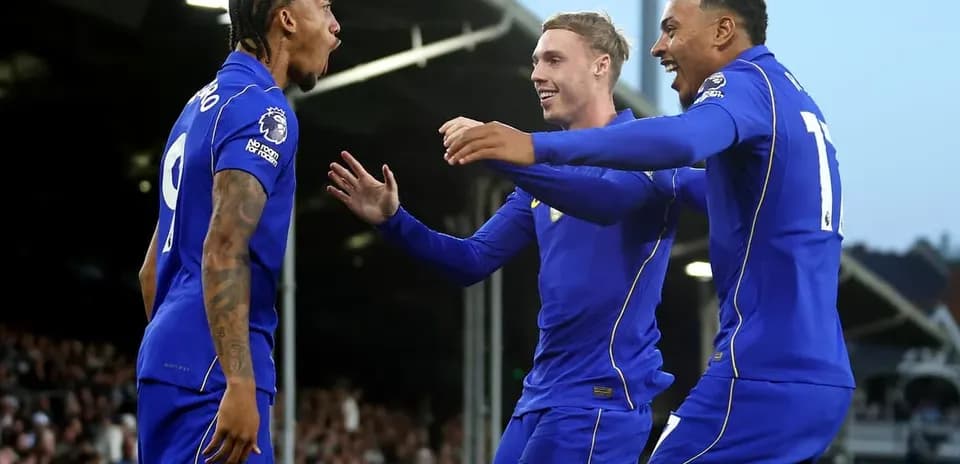 Chelsea players celebrating a goal together