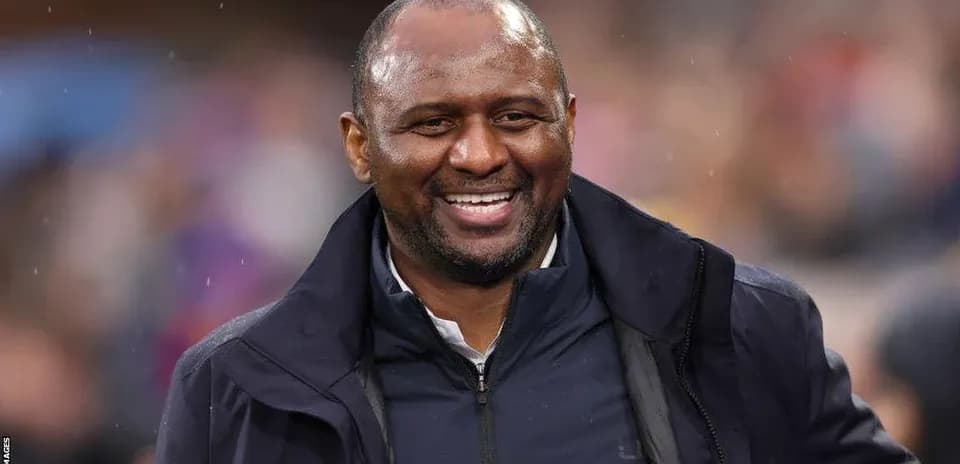 Man smiling during a football match event