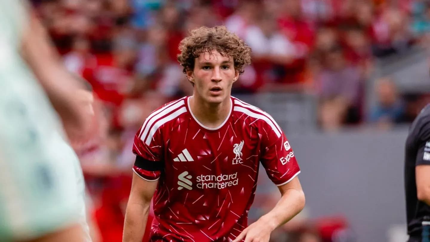 Player in red Liverpool kit during match action