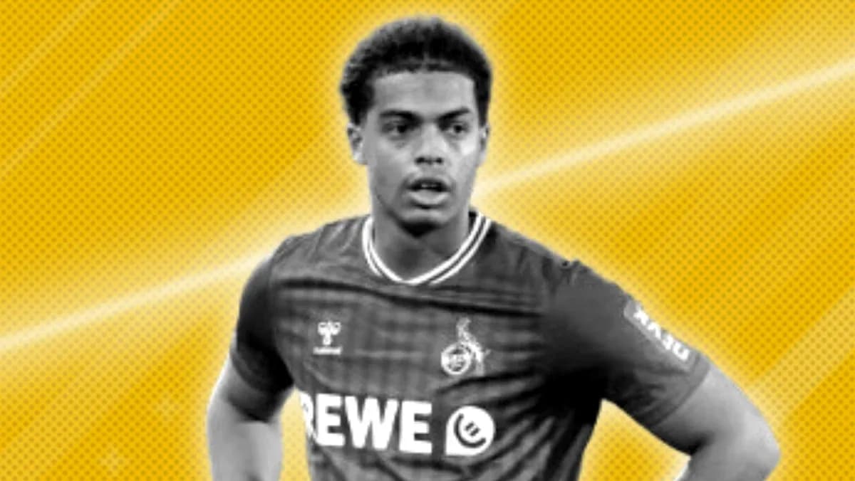 Player in football kit with team logo
