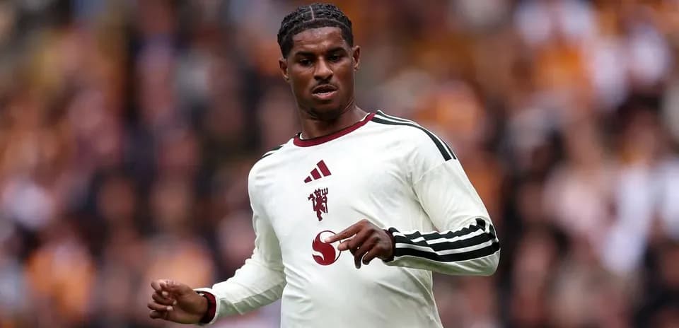 Player in white kit during match action