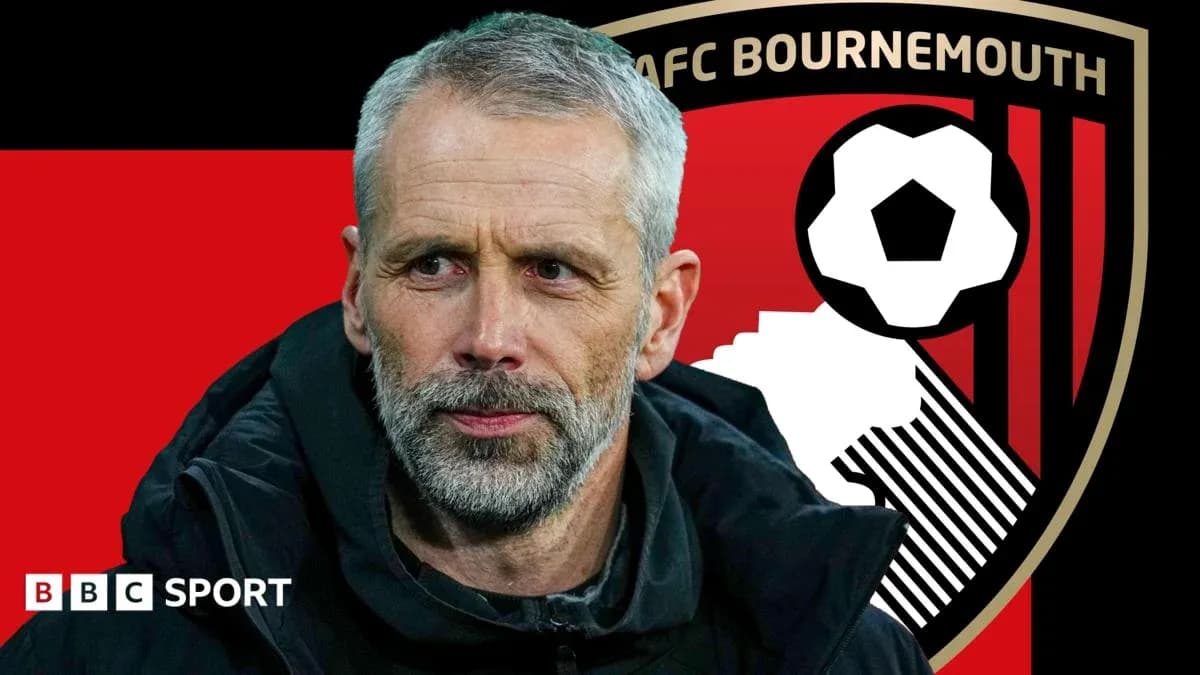 AFC Bournemouth manager with club logo background
