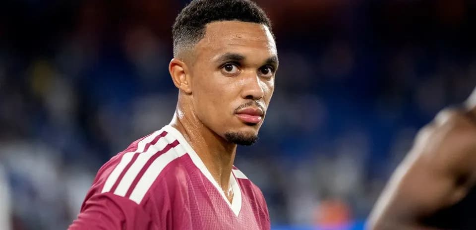 Player in maroon jersey looking at the camera