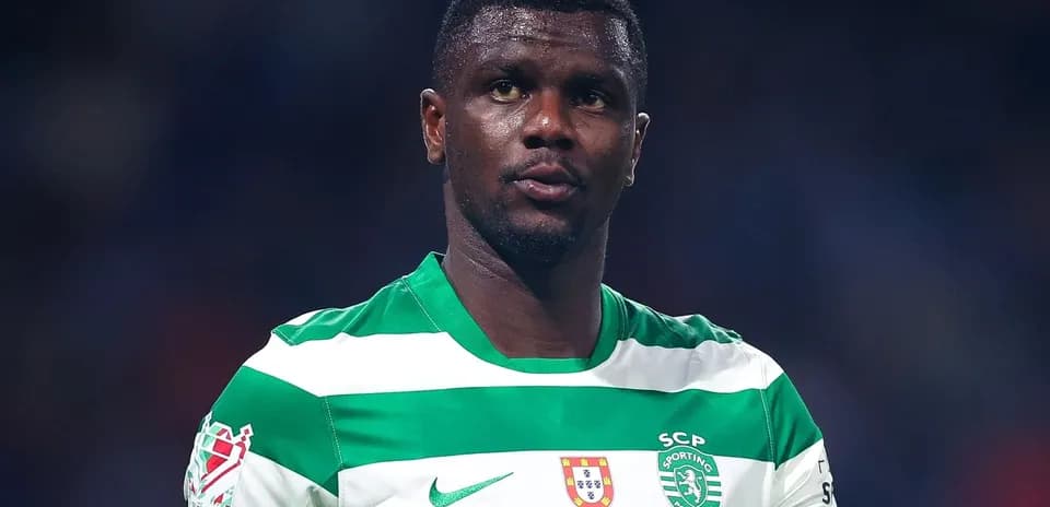 Player in green and white striped jersey during match