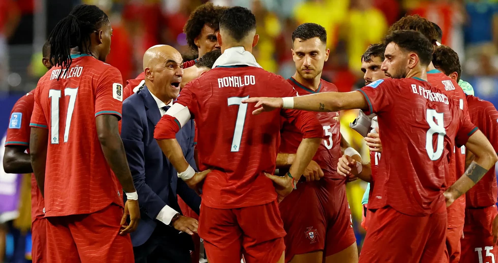 Portugal team discussing strategy during match