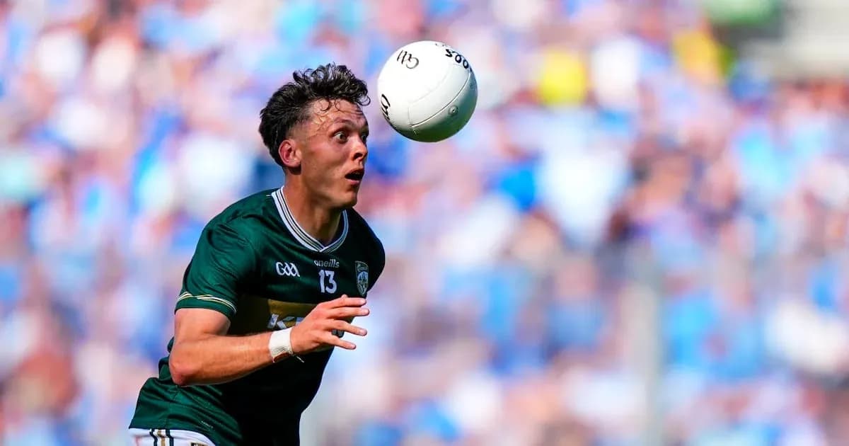 Player catching a ball during a football match
