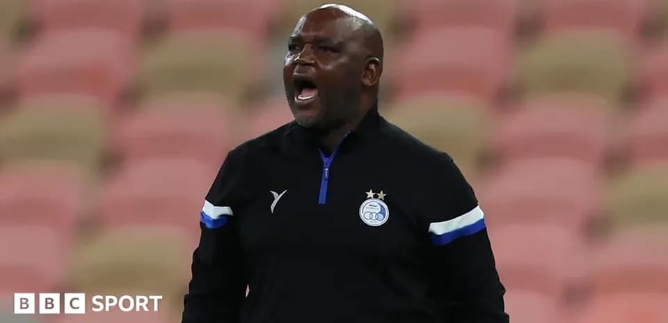 Coach shouting instructions from the sidelines