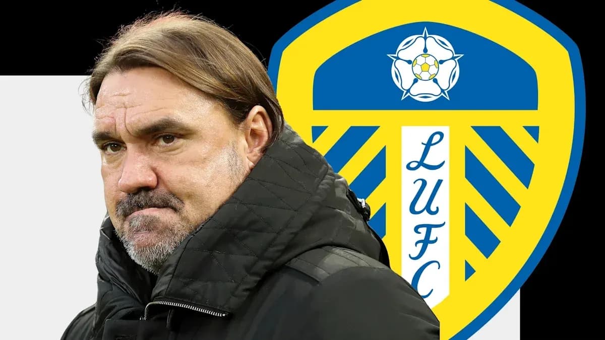 Coach in front of Leeds United club logo