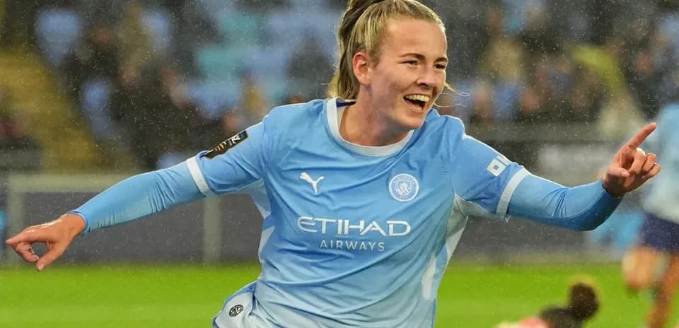 Player celebrating a goal on the field