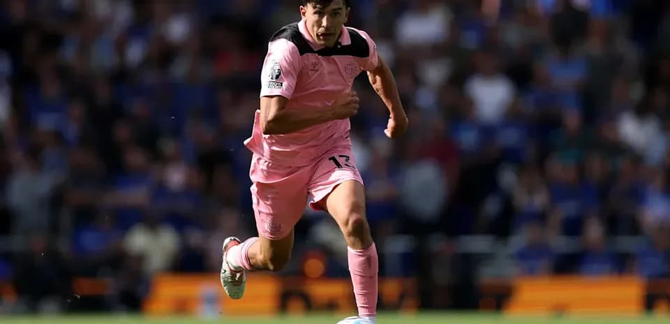 Player sprinting with ball during match