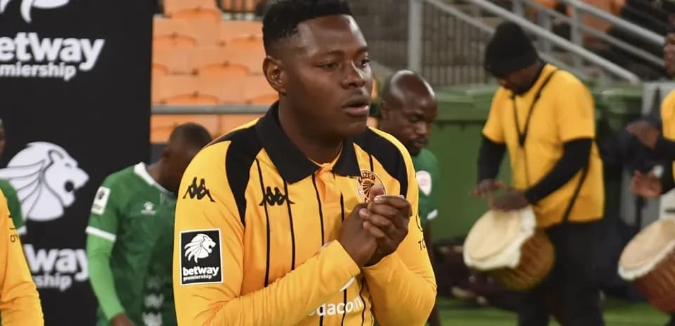Player in yellow jersey walking onto the field