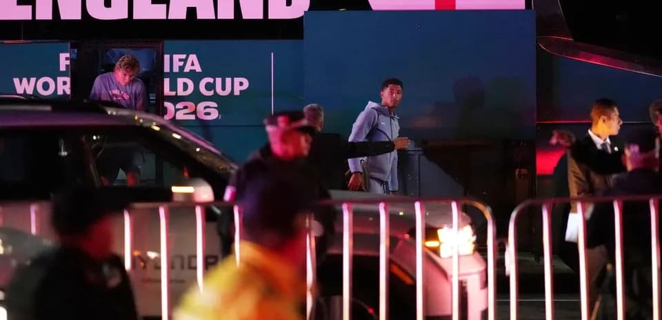 England players arriving at World Cup team bus