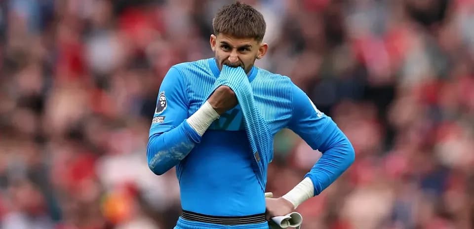 Goalkeeper pulling his shirt during match