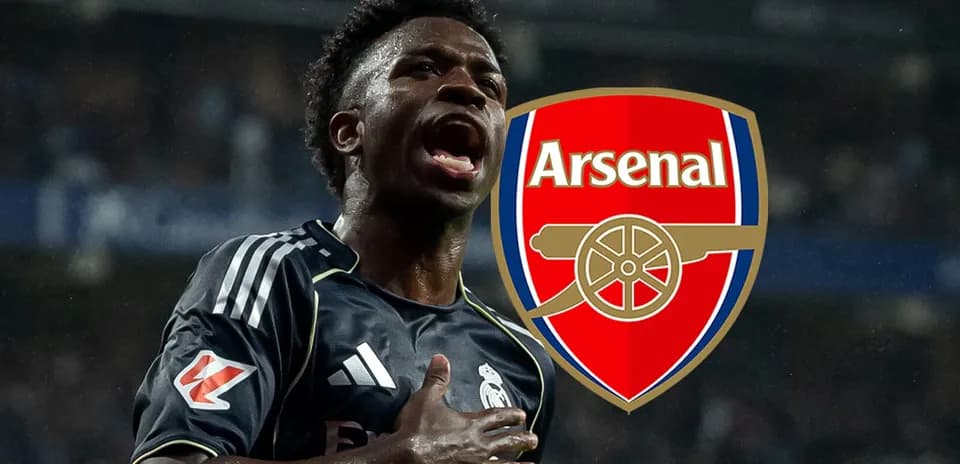 Player celebrating with Arsenal logo in background