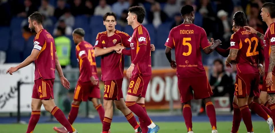 AS Roma players celebrating during a match
