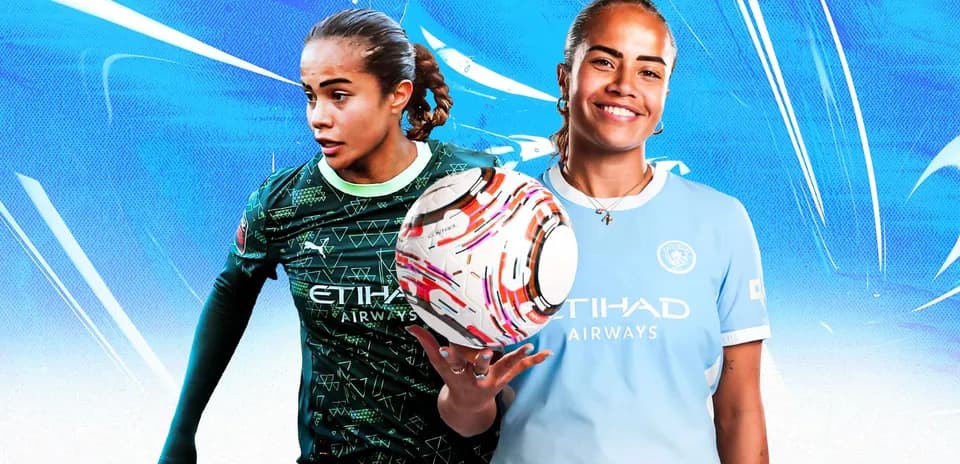 Two female soccer players in Manchester City kits