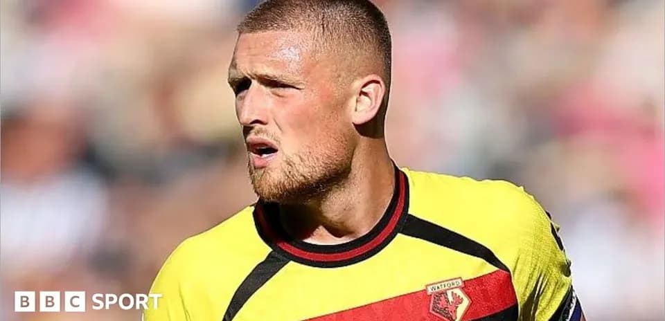 Player wearing Watford jersey during a match