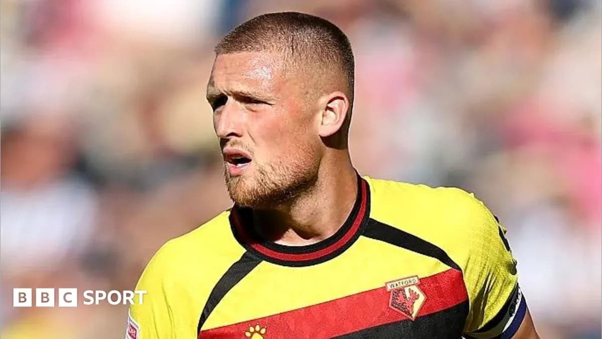 Player wearing Watford jersey during a match
