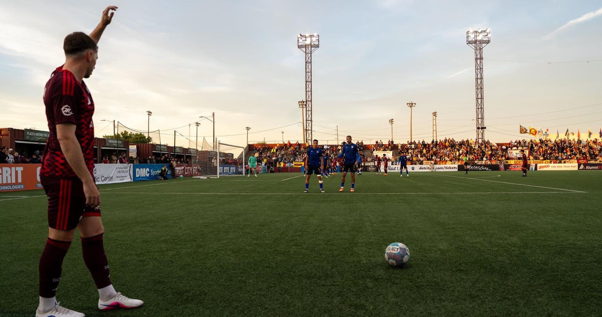 Detroit City player preparing for free kick