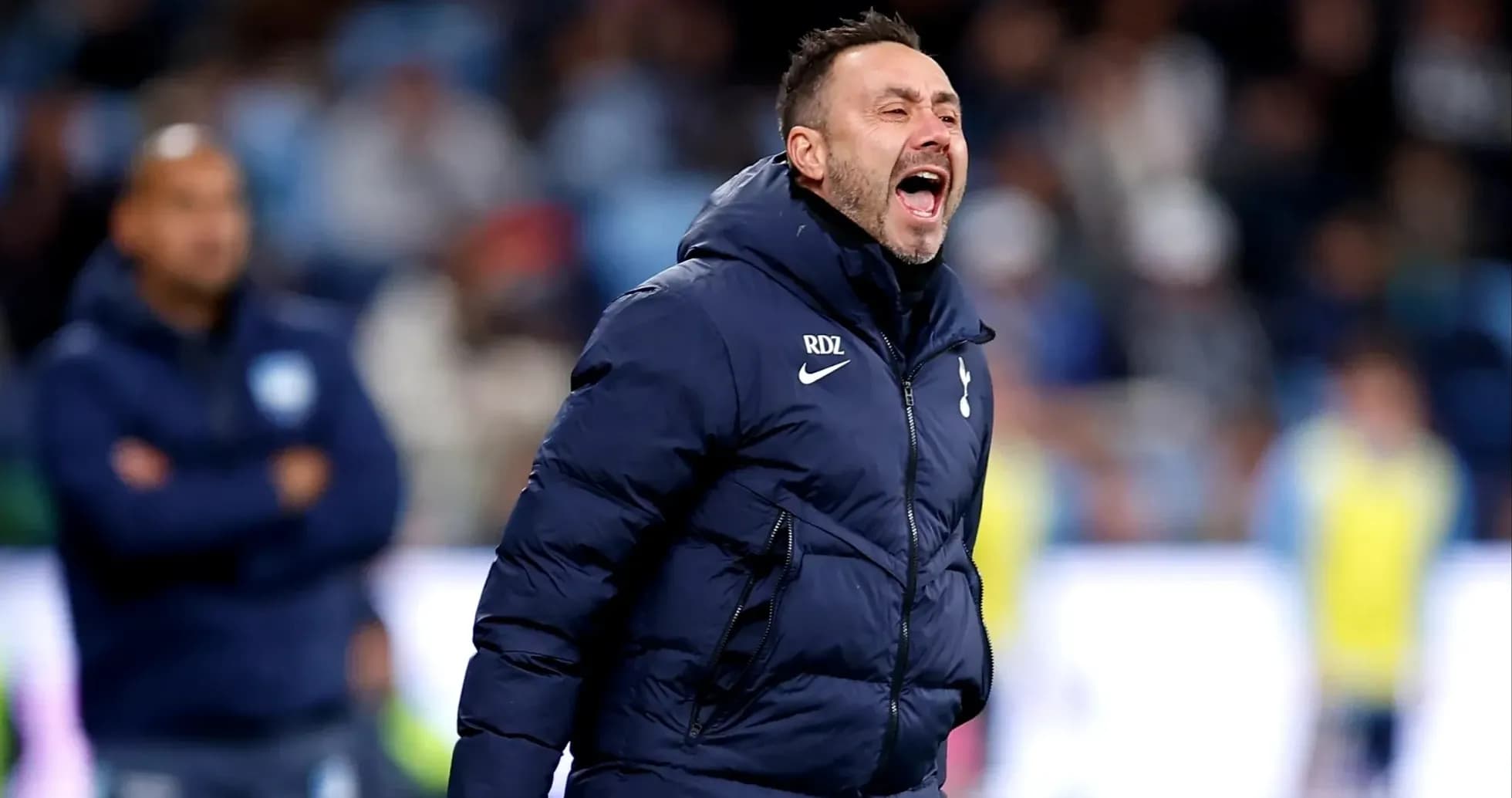 Coach shouting from the sidelines during a match