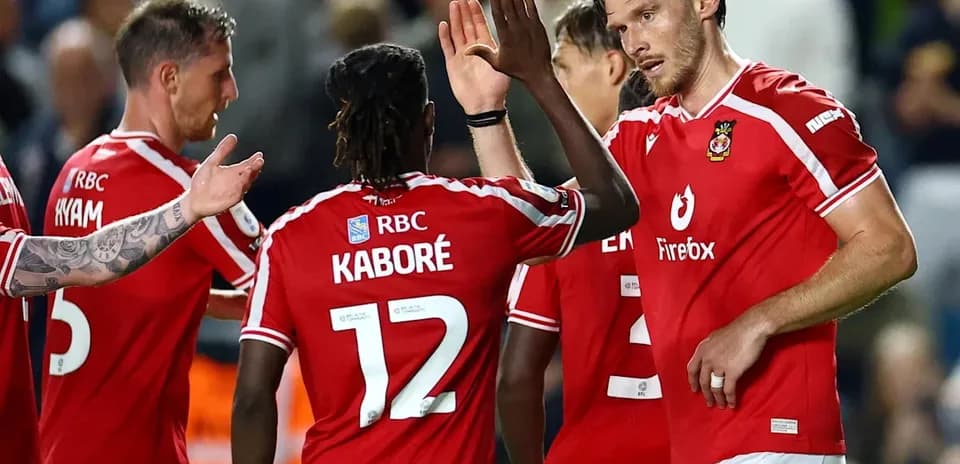 Players celebrating together on the field