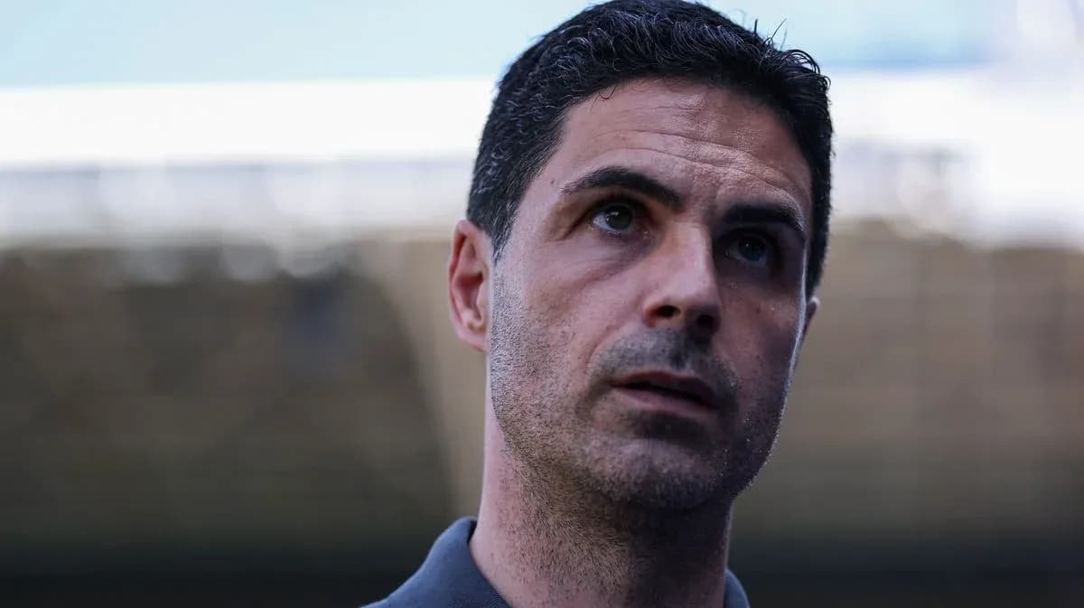 Coach speaking during a press conference