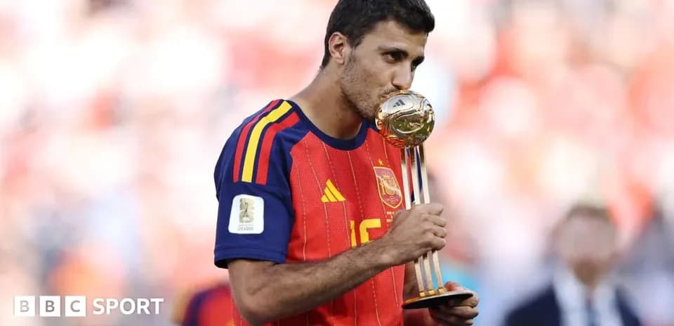Player kissing trophy after winning tournament