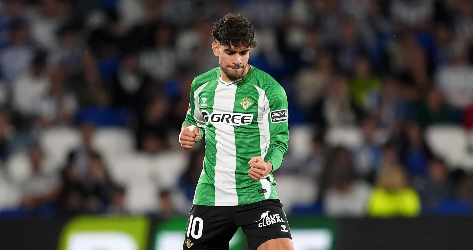 Player celebrating a goal on the field