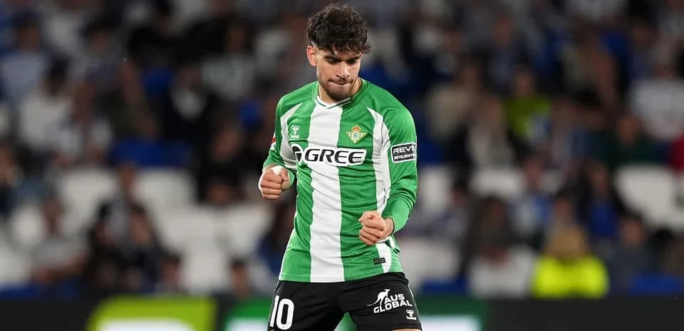 Player celebrating a goal on the field