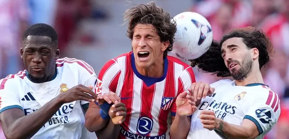 Players competing for the ball during intense match