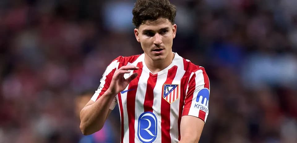 Atletico Madrid player gesturing during a match