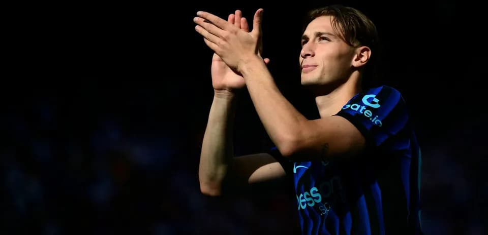 Player applauding fans during match celebration