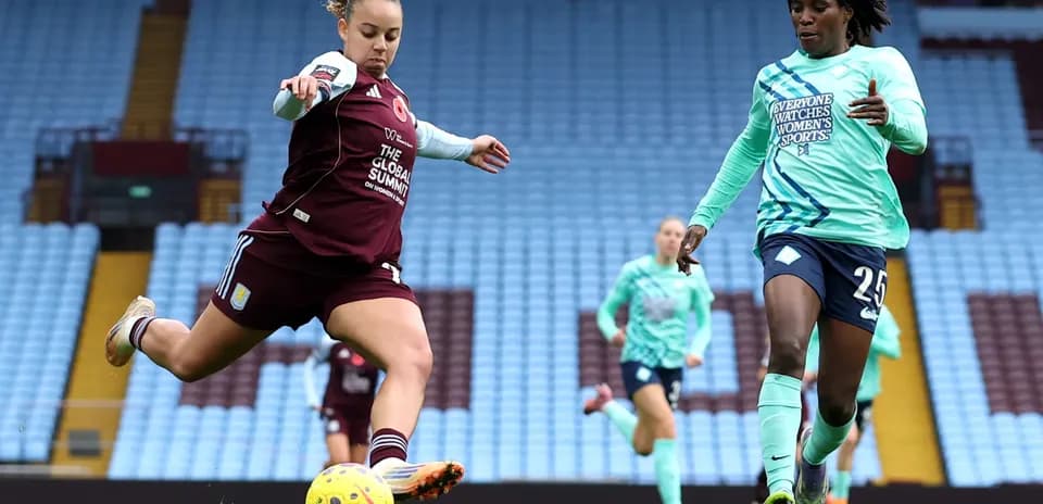 Player kicking ball during Lionesses vs Aston Villa match