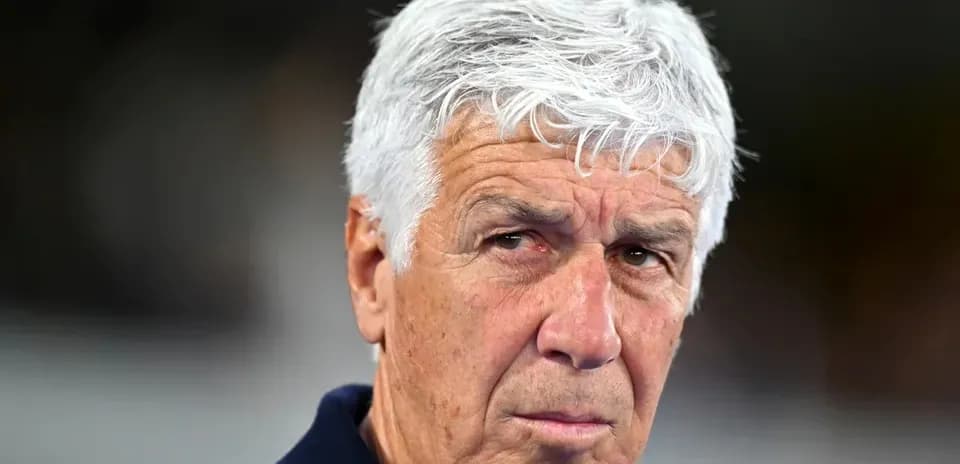 Coach with gray hair during match preparation