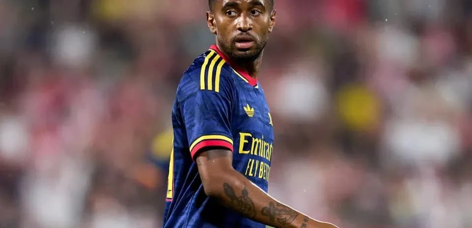 Player in blue jersey on football pitch