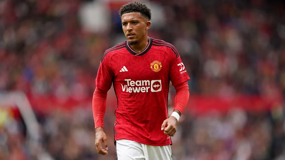 Player in red Manchester United jersey on field