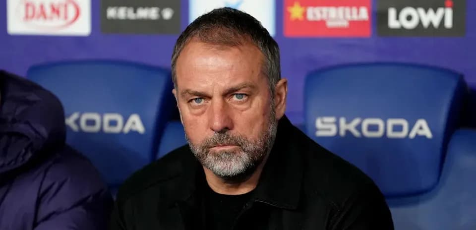 Coach sitting on bench during a match