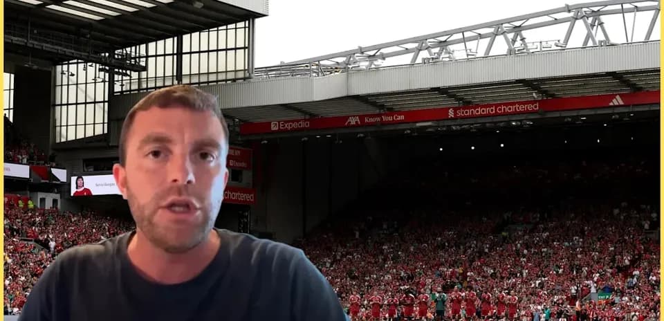 Presenter in front of Anfield stadium and crowd