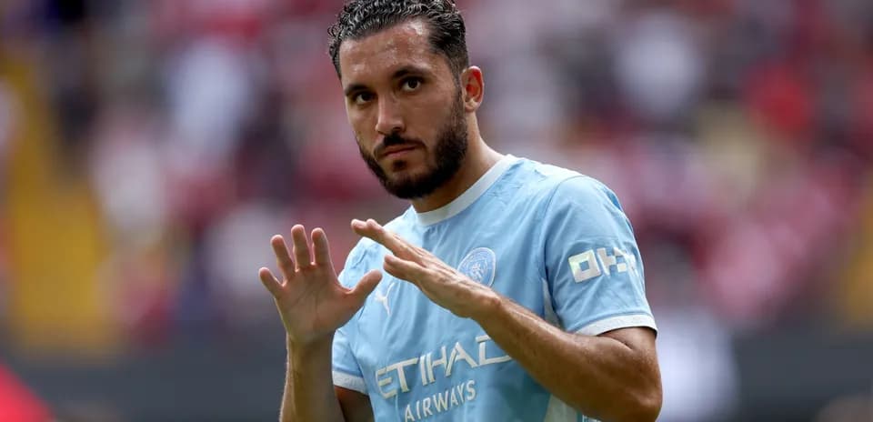 Player gesturing during warm-up before match