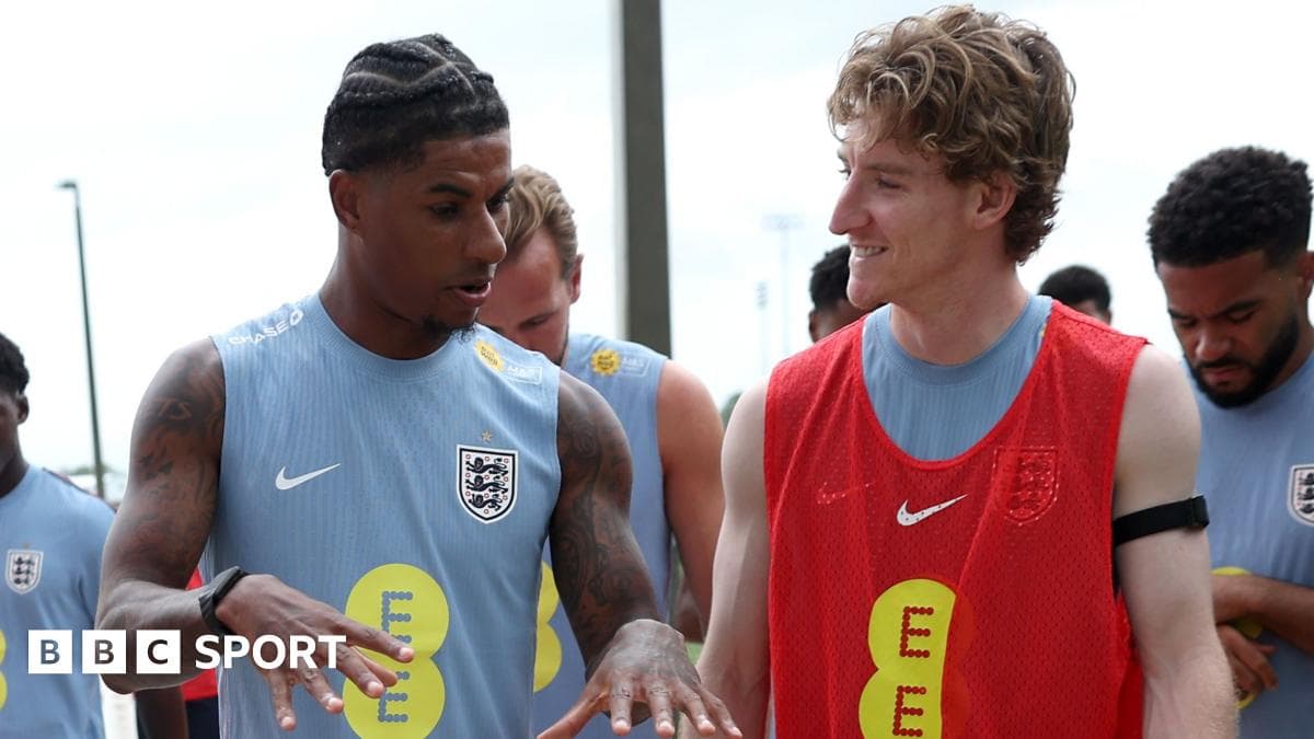 Two players discussing during England training session