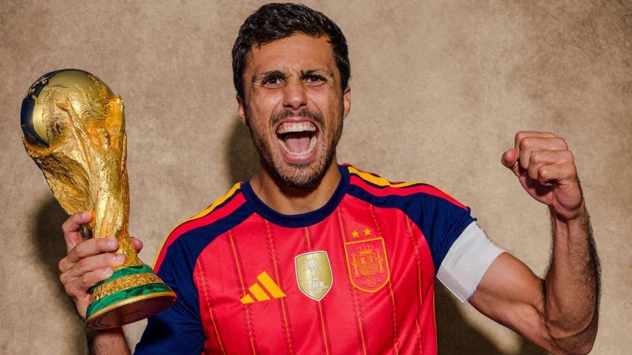 Player celebrating with World Cup trophy in hand