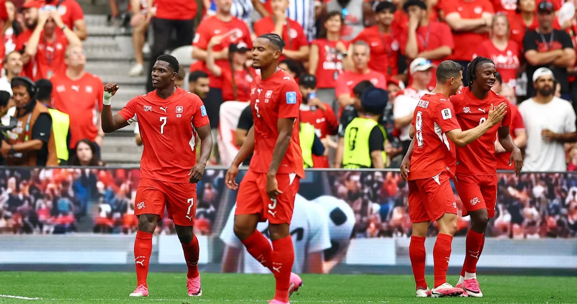 Swiss players celebrating a goal during match