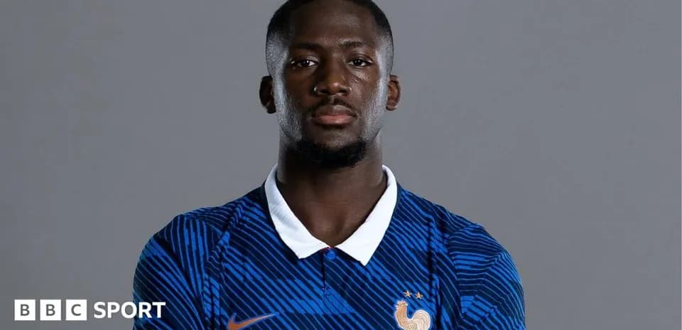 Player in France national team jersey posing for portrait